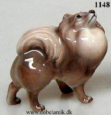 Pommeranian. H. 7 cm.  kr 1200.-