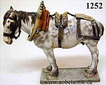 Fransk arbejdshest. L. 31.5 cm.  kr 10500.-