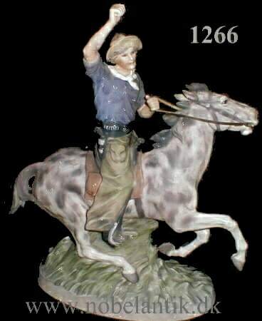 Cowboy til hest. - H. 41.0 cm. - 18000.-
